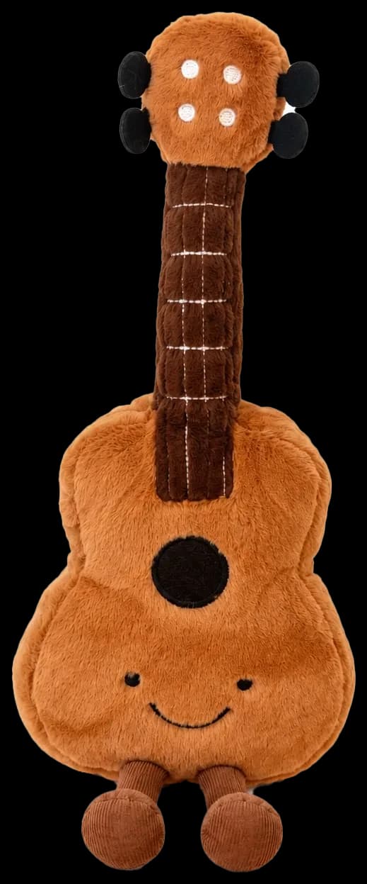 A smiling plush guitar character